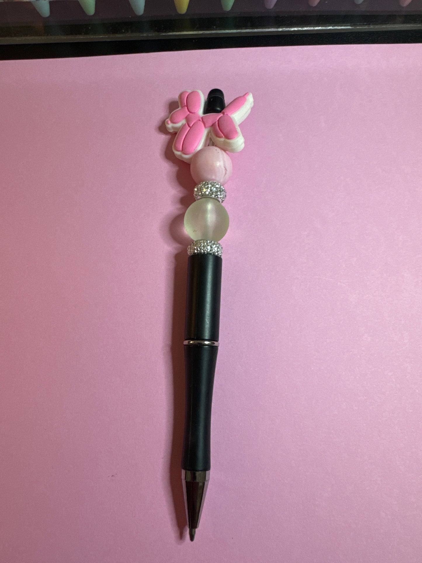 Blk, pink pen